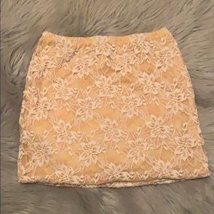 Yellow laced miniskirt.